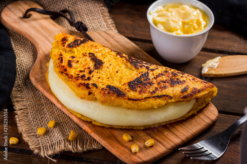 Cachapa with cheese, typical Venezuelan dish made with corn, cheese and butter