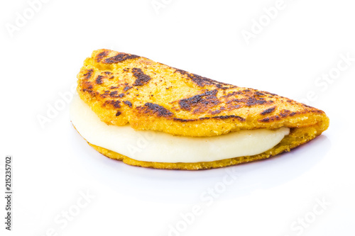 Cachapa with cheese, Typical Venezuelan cuisine made of ground corn and white cheese, white background photo