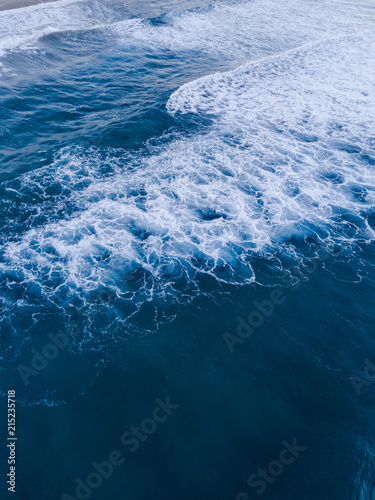 Aerial view of wave foam.
