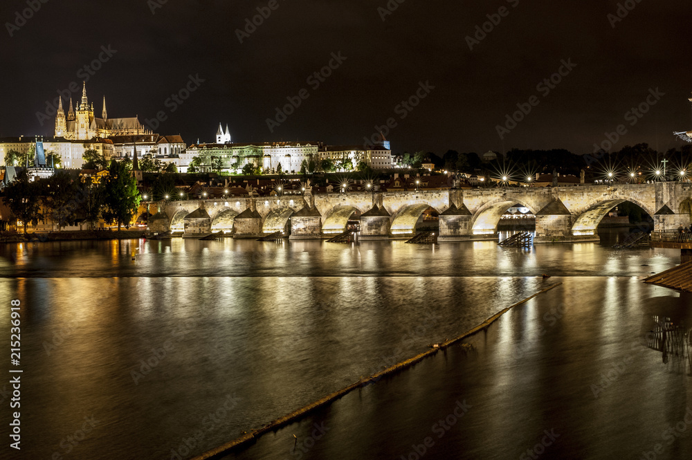 Charles Bridge (Karluv Most) and Old Town in Prague, Czech Republic by night.