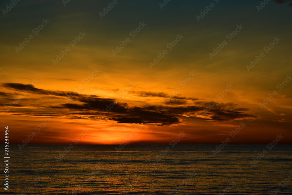 Amazing beach sunset with endless horizon