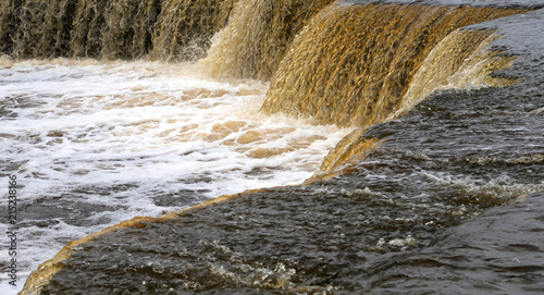 Small waterfall on Tosna River. photo