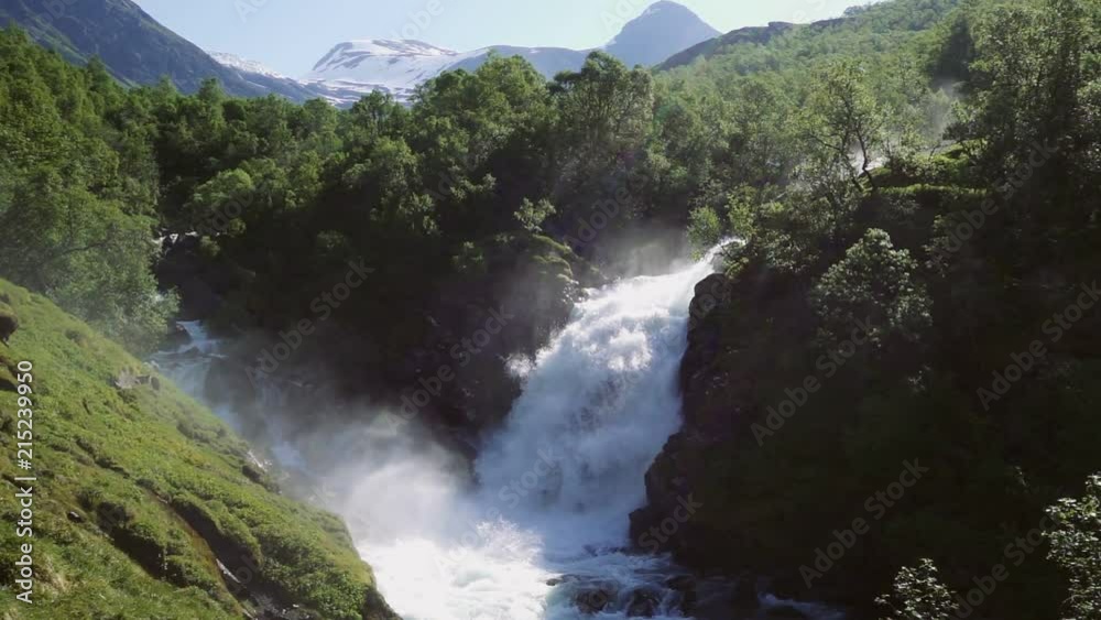 Rapid Stunning Waterfall in Husedalen Valley, Norway. Summer time. Nyastølsfossen Rapid Stunning Waterfall in Husedalen Valley, Norway. Summer time. Nyastølsfossen