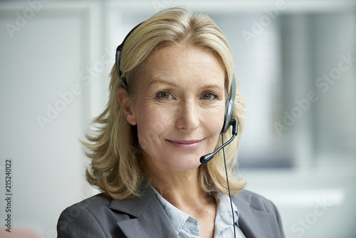 Close-up of telecaller with headset photo