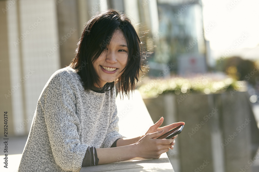 Woman using smart phone Woman using smart phone