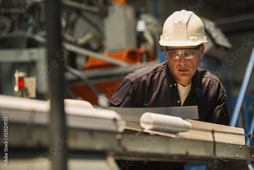 Factory worker working in factory photo