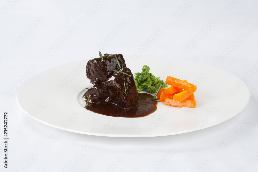 Braised lamb with vegetables and spetsle. Braised lamb with vegetables and spetsle.