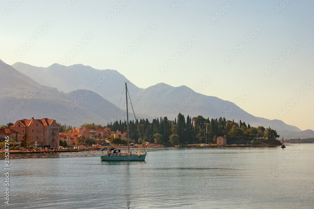 Morning Mediterranean landscape.  Montenegro, Bay of Kotor, Adriatic Sea. View of embankment of Tivat city
