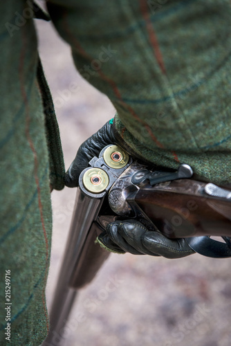 Broken Gun In Leather Gloved Hand