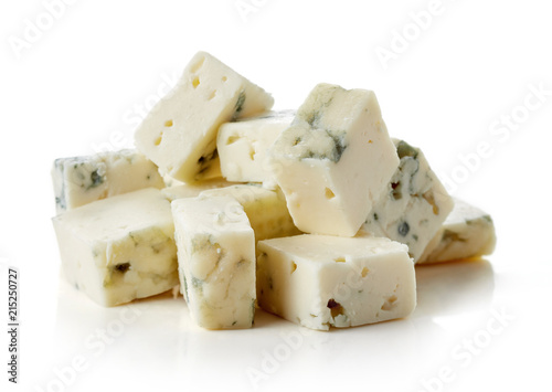 Blue cheese cubes isolated on white photo