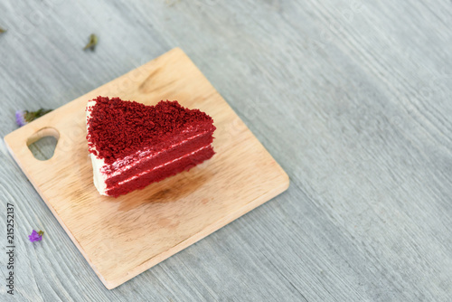 Delicious Red velvet slice cake on wood board