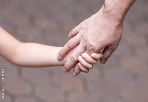 Holding hand, mother and daughter