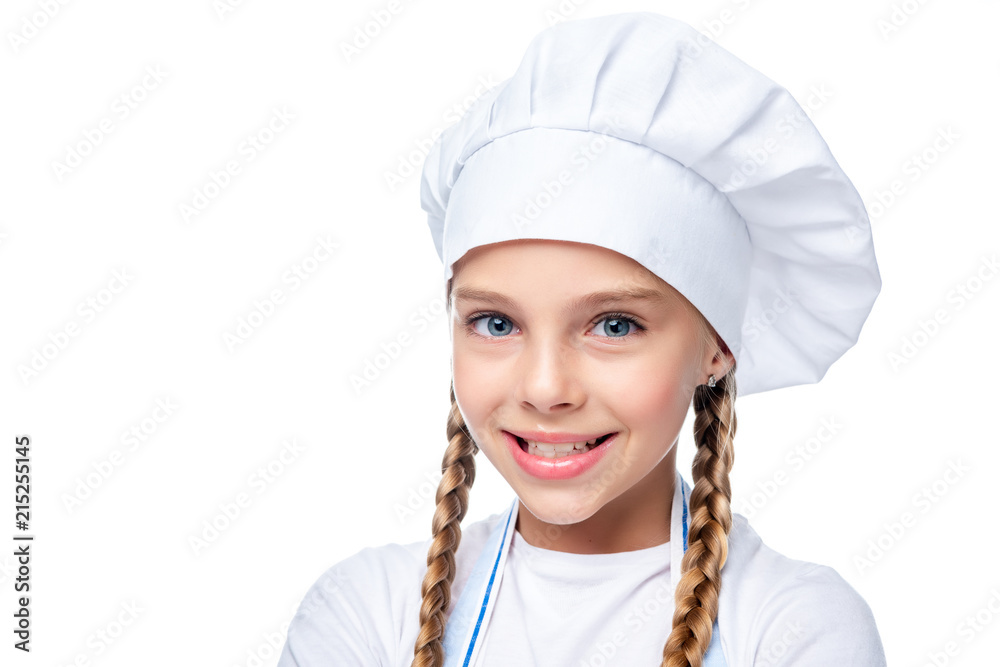 portrait of schoolchild in chef hat looking at camera isolated on white portrait of schoolchild in chef hat looking at camera isolated on white