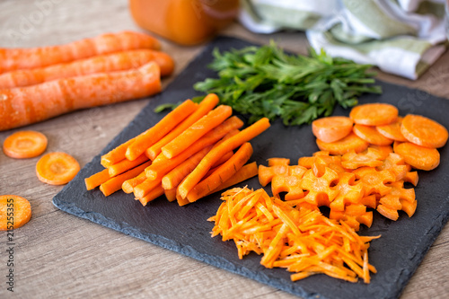 Cutting carrots-Healthy foods, cooking and vegetarian concept.