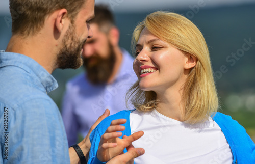 Couple in love happy dating, jealous bearded man watching wife cheating him with lover. Couple romantic date lovers flirting. Lovers meeting outdoor flirt romance relations. Jealous concept