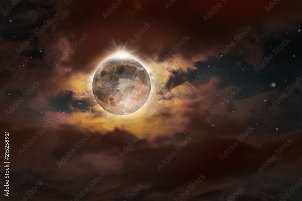 Naklejka premium Full moon eclipse on sky surrounded by colorful glow on July 27, 2018