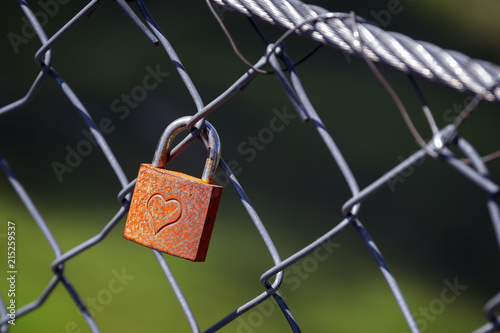 Red love padlock with engraved heart