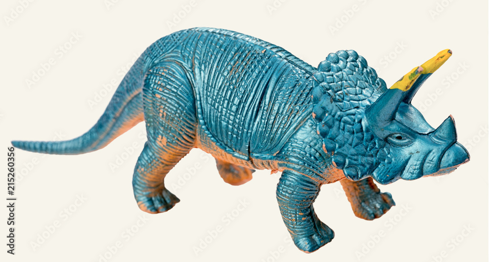 triceratops dinosaur toy isolated on white background