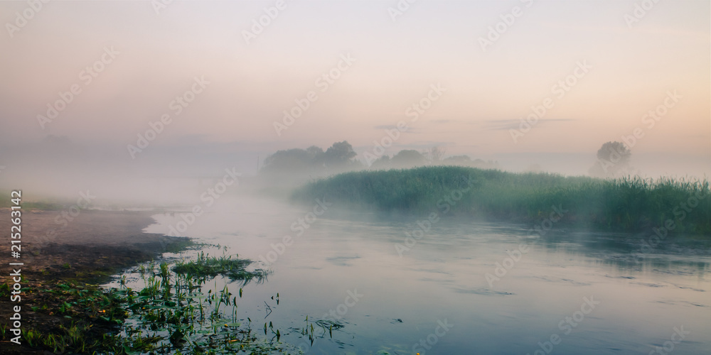 Biebrza Natural Park - foggy sunrise over Biebrza river. 