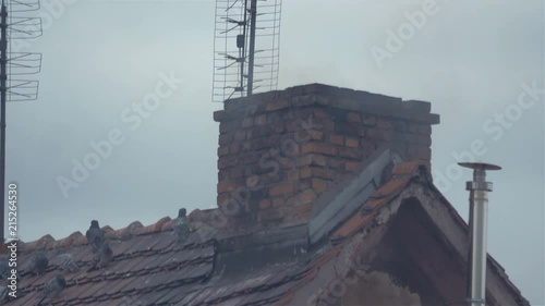 Professional video of smoke from the chimney in 4k slow motion 60fps photo