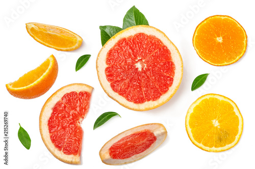 Sliced pieces of grapefruit, orange, lemon isolated on white, top view