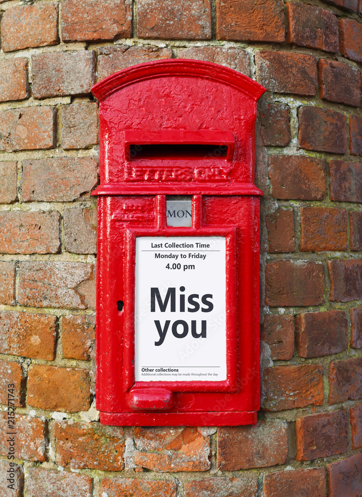 Miss you message on a post box