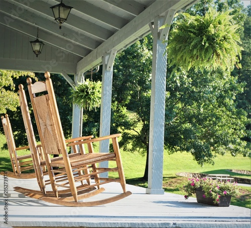 The wooden rocking chairs at the terrace house with the beautiful view of garden and big trees ,TENN USA