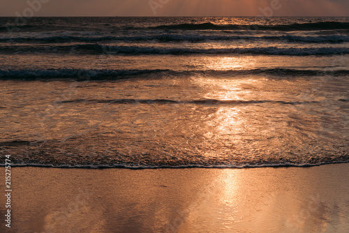 Seascape before sunrise on beach photo