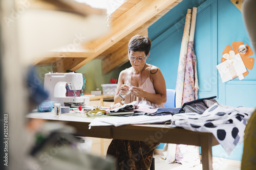 Fashion designer at work in her studio photo