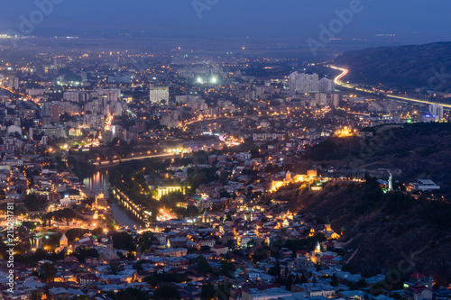 Beautiful aerial view of Tbilisi city with illumination, Tbilisi, Georgia