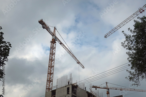 high construction cranes on site
