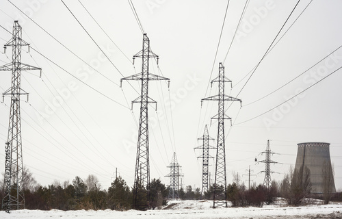 Electricity pylons and cooling tower