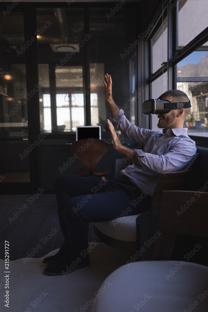 Businessman using virtual reality headset Businessman using virtual reality headset