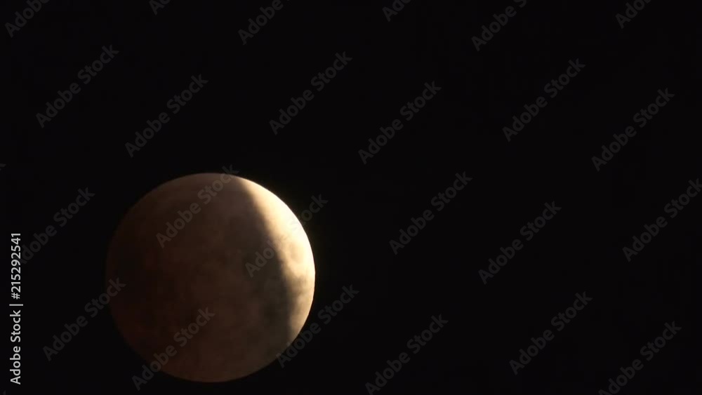 Lunar Eclipse on 28 of July 2018 - the moon appears darkened as it passes into the earth's shadow. It was observed in the European part of Russia. Timelapse video.
