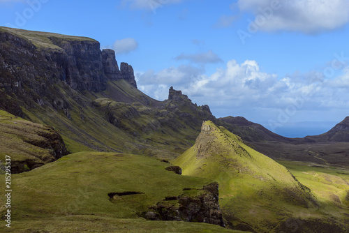 Grassy cliffs and mountain landscape on the Trotternish Peninsula on the Isle of Skye, Scotland, United Kingdom