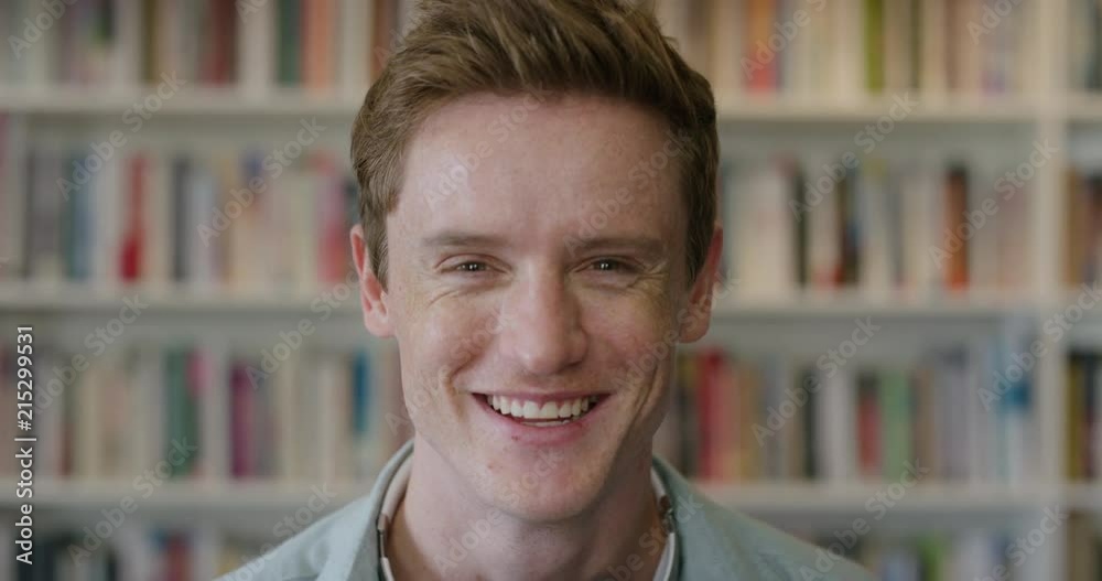 close up portrait charming young man student laughing enjoying relaxed college lifestyle in bookshelf background red hair freckles close up portrait charming young man student laughing enjoying relaxed college lifestyle in bookshelf background red hair freckles