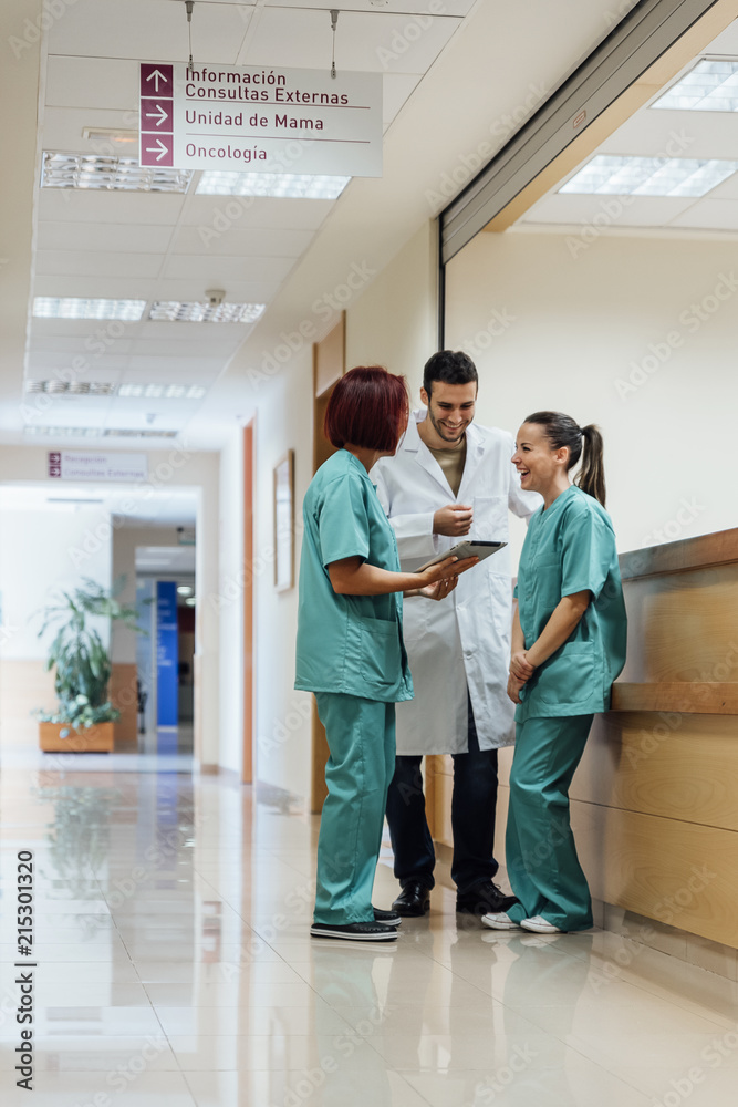 Cheerful medics with tablet Cheerful medics with tablet