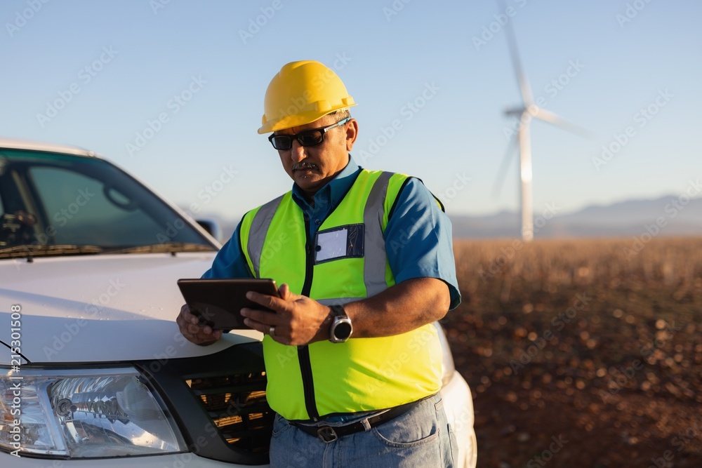 Engineer using a digital tablet Engineer using a digital tablet