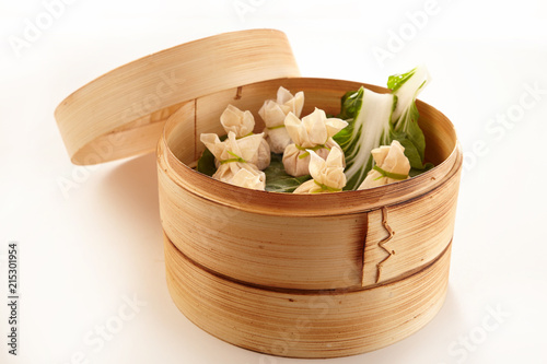Chinese dim sum dumplings in bamboo basket