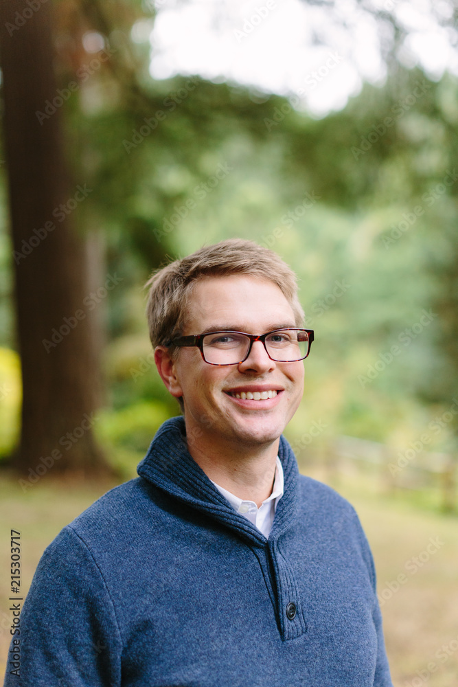 Portrait of Man Wearing Glasses Outdoors