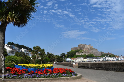 Mont Orgueil casting its shadow over the beautiful fishing village of Gorey. Jersey, England photo