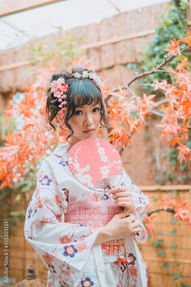 Asian young woman in traditional kimono clothing