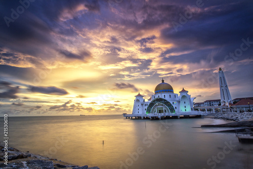 Majestic sunset of Mosque at selat Melaka, Malaysia