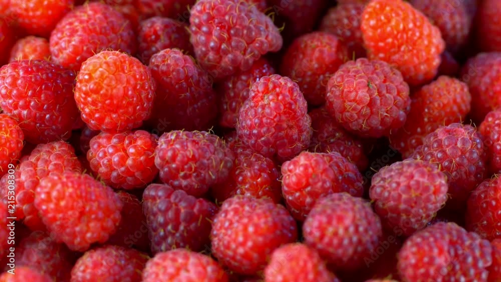 Fresh raspberry fruits as food background. Healthy food organic nutrition. View from above. Fresh raspberry fruits as food background. Healthy food organic nutrition. View from above.