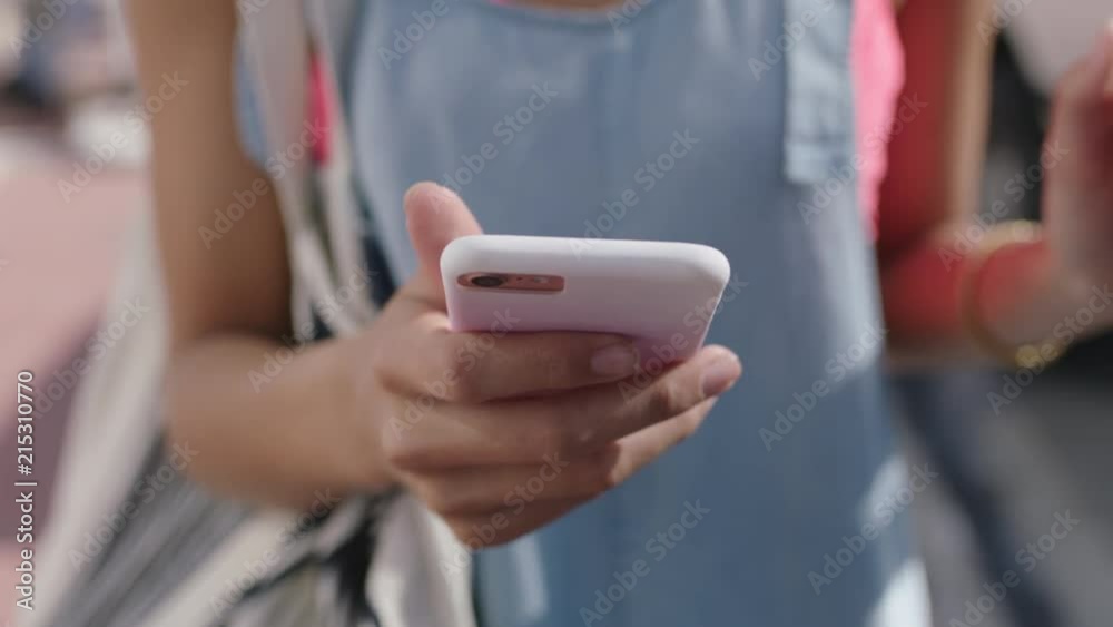 close up of woman hands using smartphone texting social media