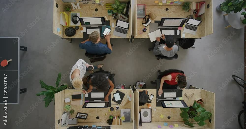 young multi ethnic business team working in office multitasking diverse employees networking developing creative ideas for successful startup company top view