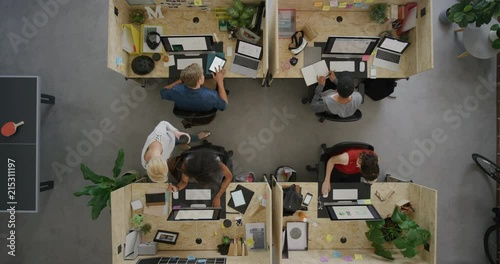 young multi ethnic business team working in office multitasking diverse employees networking developing creative ideas for successful startup company top view