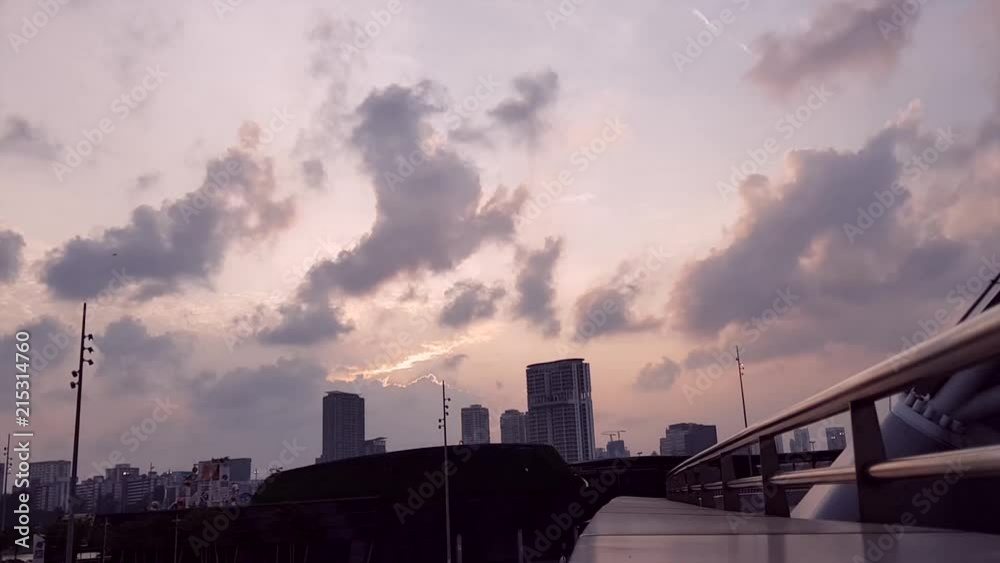 Timelapse of the skyline in Singapore close to the Nation's national day. Shot at sunset Timelapse of the skyline in Singapore close to the Nation's national day. Shot at sunset