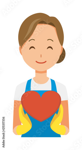 A woman wearing a blue apron and rubber gloves has a heart mark