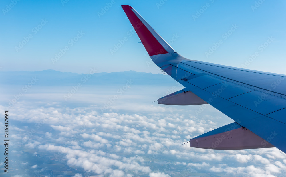 view from airplane window to see sky. view from airplane window to see sky.